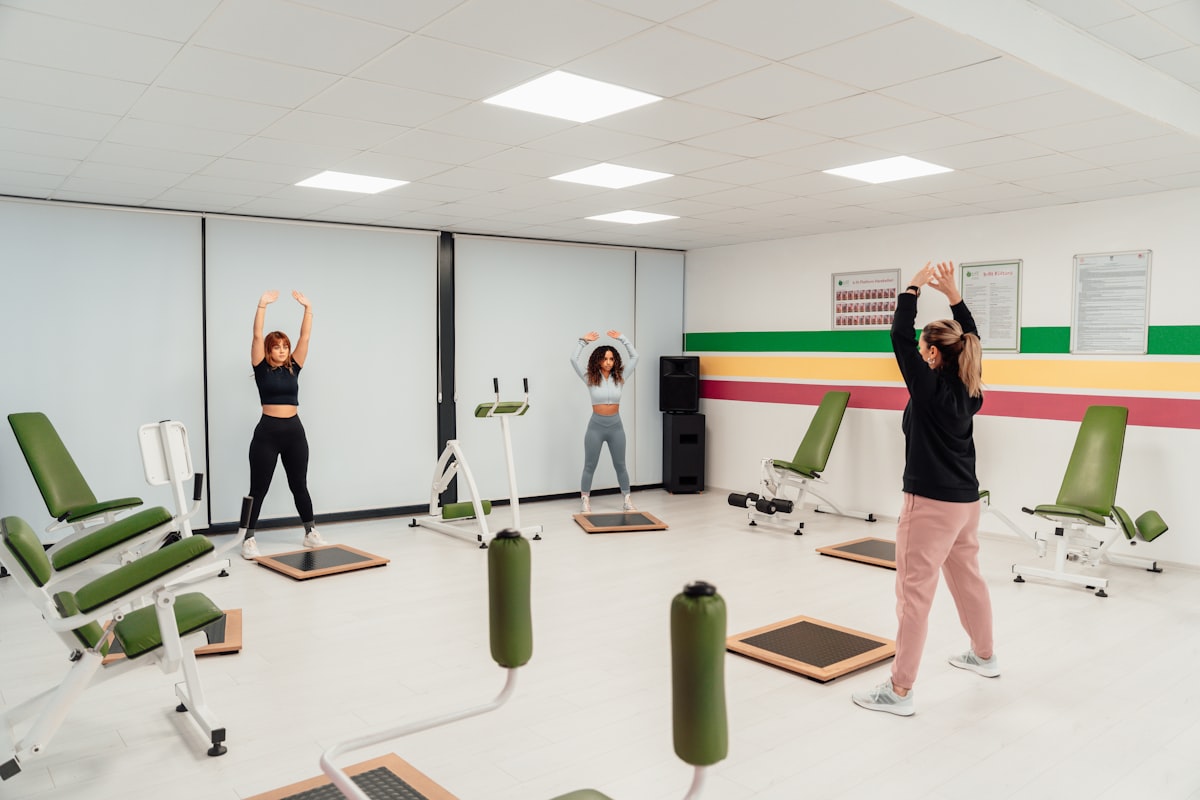 Group movement restoration class with participants in standing position